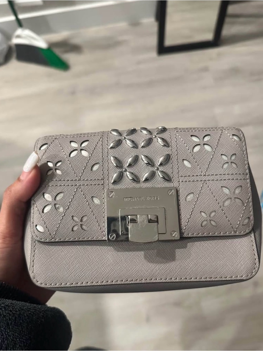 Michael Kors Light Gray Leather Crossbody Clutch with Floral Cutouts